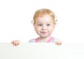 Curly cute child face holding advertising sign