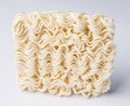 Curly dry instance noodle on white Royalty Free Stock Photo