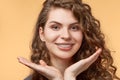 Curly hair woman with brackets Royalty Free Stock Photo