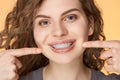 Curly hair woman with brackets Royalty Free Stock Photo