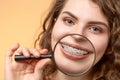 Curly hair woman with brackets Royalty Free Stock Photo