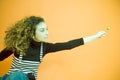 Curly Haired Girl Giving a Lollipop Royalty Free Stock Photo