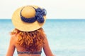 Curly haired woman looking at the sea Royalty Free Stock Photo