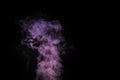 Curly purple, lilac steam, Fog or smoke isolated transparent special effect on black background. Abstract mist or smog Royalty Free Stock Photo