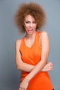 Curly seductive flirty girl showing tongue Royalty Free Stock Photo