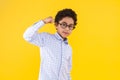 African black ethnicity boy isolated on yellow background Royalty Free Stock Photo