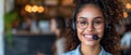 Curlyhaired Service Rep Enthusiastically Communicates With Customers Via Headset