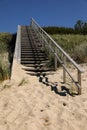 Wooden footpath through dunes at the Baltic sea inLithuania, Curonian Spit . Royalty Free Stock Photo