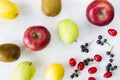 Currant, Cornus and dogberry, lemon, apple and kiwi high angle view Royalty Free Stock Photo