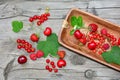 Currants, strawberries, cherries and raspberries on a rustic table Royalty Free Stock Photo