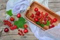 Currants, strawberries, cherries and raspberries on a rustic table Royalty Free Stock Photo