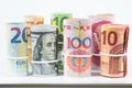 Currencies and money exchange trading concepts. The rolls of var Royalty Free Stock Photo