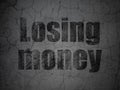 Currency concept: Losing Money on grunge wall background Royalty Free Stock Photo