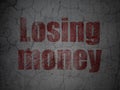 Currency concept: Losing Money on grunge wall background Royalty Free Stock Photo