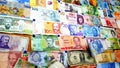Currency of different countries background. Colorful banknotes of different countries as background close up Royalty Free Stock Photo