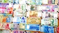Currency of different countries background. Colorful banknotes of different countries as background close up Royalty Free Stock Photo