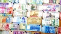 Currency of different countries background. Colorful banknotes of different countries as background close up Royalty Free Stock Photo