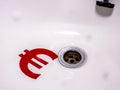 Currency Down The Plughole Royalty Free Stock Photo