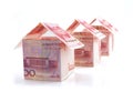 Currency houses in a row Royalty Free Stock Photo