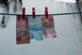 Currency on a laundry line, Royalty Free Stock Photo