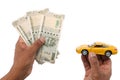 Indian currency notes and toy car in the hands bank loan concept Royalty Free Stock Photo