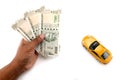 Indian currency notes and toy car in the hands bank loan concept Royalty Free Stock Photo