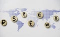 Currency sign include dollar Yuan Yen Euro Ruble Rupee and Pound sterling print screen on wooden with dot world map for money Royalty Free Stock Photo