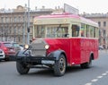 Retro bus carries tourists, conducts city tours. Travel around St. Petersburg.