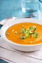 Curried carrot soup with cream and herbs Royalty Free Stock Photo
