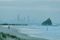 Currumbin rock with Gold Coast City as background Royalty Free Stock Photo