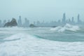 Currumbin rock with Gold Coast City as background Royalty Free Stock Photo