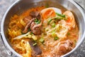 curry bone soup - bone noodle soup pork with boiled eggs in hot pot, Thai food tom yum hot and sour soup Royalty Free Stock Photo