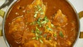 Curry chicken Nepali Rogan Josh food spicy fennel seeds dried ginger powder vegetable meal Nepalese plate orange sauce