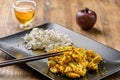 Curry chicken and oriental rice in a dish Royalty Free Stock Photo