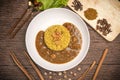 Curry chicken with yellow rice on plate over wooden background, Chicken with basmati rice Royalty Free Stock Photo