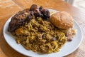 Jamaican curry goat, jerk chicken and fried dumpling