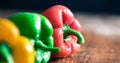 Curry ingredients - red, yellow and green capsicums Royalty Free Stock Photo