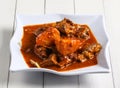 curry lamb ribs with potato served in dish isolated on table top view of singapore food Royalty Free Stock Photo