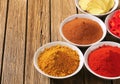 Curry powder, paprika, ground cinnamon, sliced ginger root and Royalty Free Stock Photo