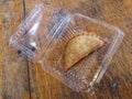 Curry puff or karipap with plastic cover Royalty Free Stock Photo