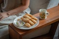 Curry puff in white dish and Tea cup on wood Royalty Free Stock Photo