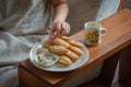Curry puff in white dish and Tea cup on wood Royalty Free Stock Photo