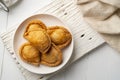 curry puff in white plate,fried curry dumpling (with meat or vegetable snuffing). Royalty Free Stock Photo