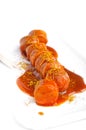 Curry sauce on sausage Royalty Free Stock Photo