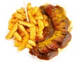 Curry Sausage with French Fries on white Background Royalty Free Stock Photo