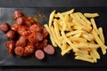 Traditional German currywurst sausages with Curry spice on wursts Royalty Free Stock Photo