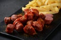 Traditional German currywurst sausages with Curry spice on wursts Royalty Free Stock Photo