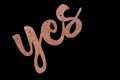 Cursive yes sign on black background for agreements, weddings, and other choice concepts in business or personal life