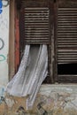 Curtain broken window shutter Royalty Free Stock Photo