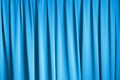 Curtain of cinema stage background, blue dramatic tone